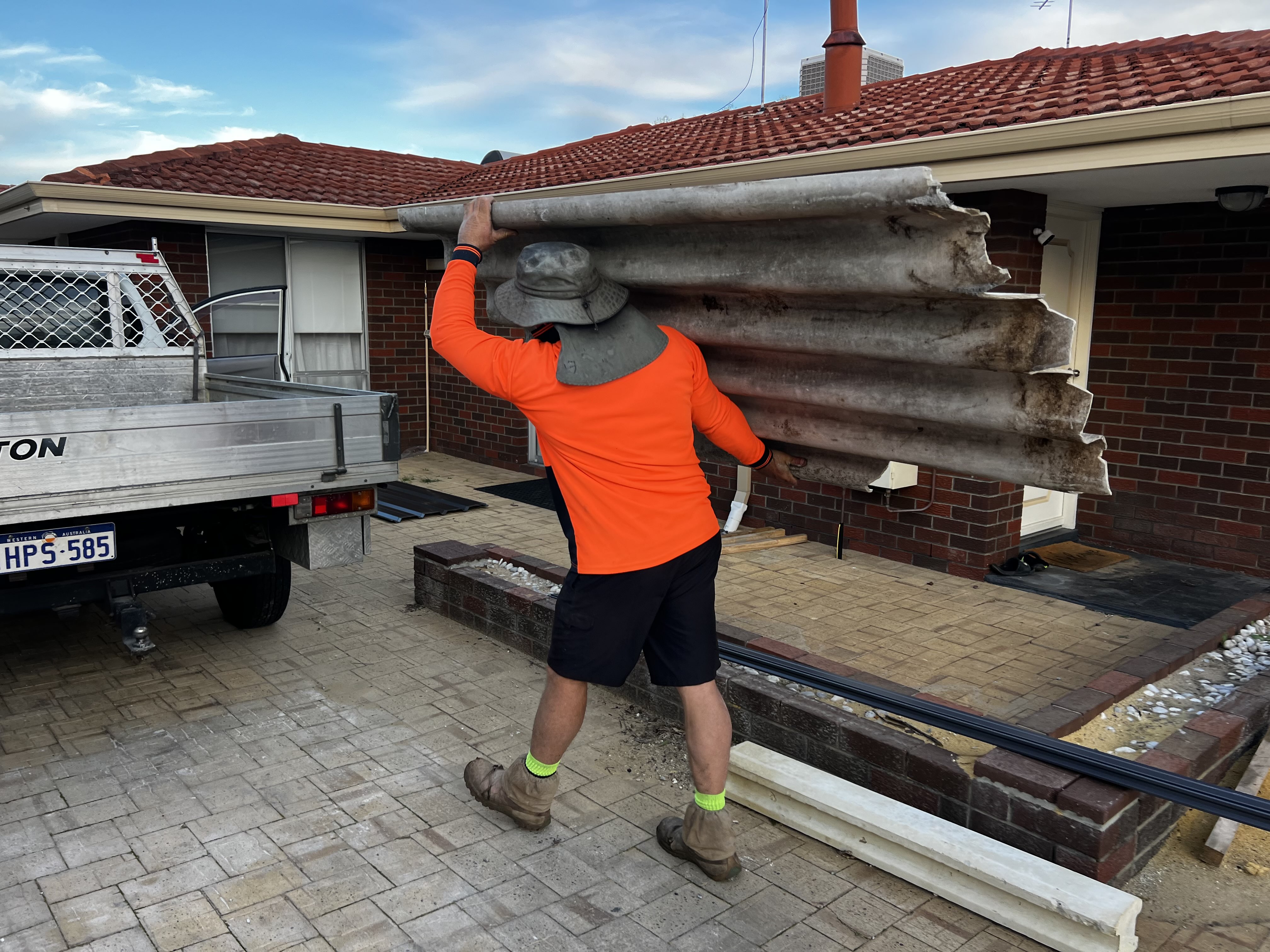 Old fence sheeting removed during a Perth fence replacement