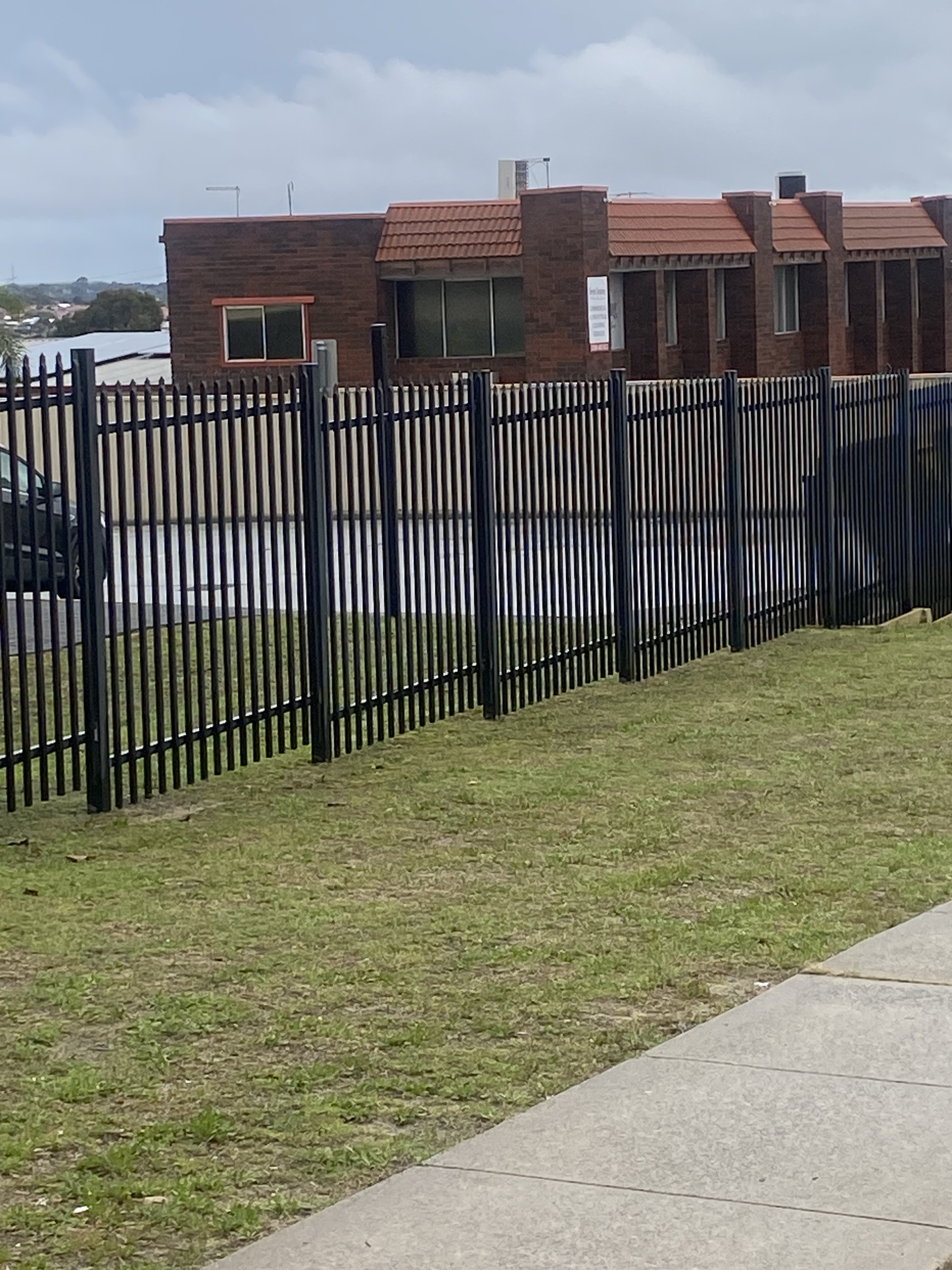 Black tubular security fencing, Perth