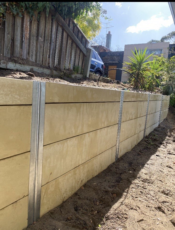 Limestone retaining wall with galvanised steel post, Perth