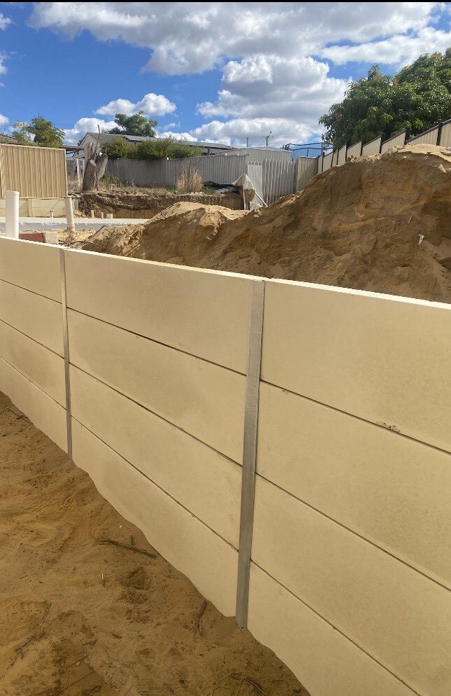 Limestone retaining wall with sand backfill, Perth